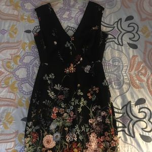 Floral knee length dress.